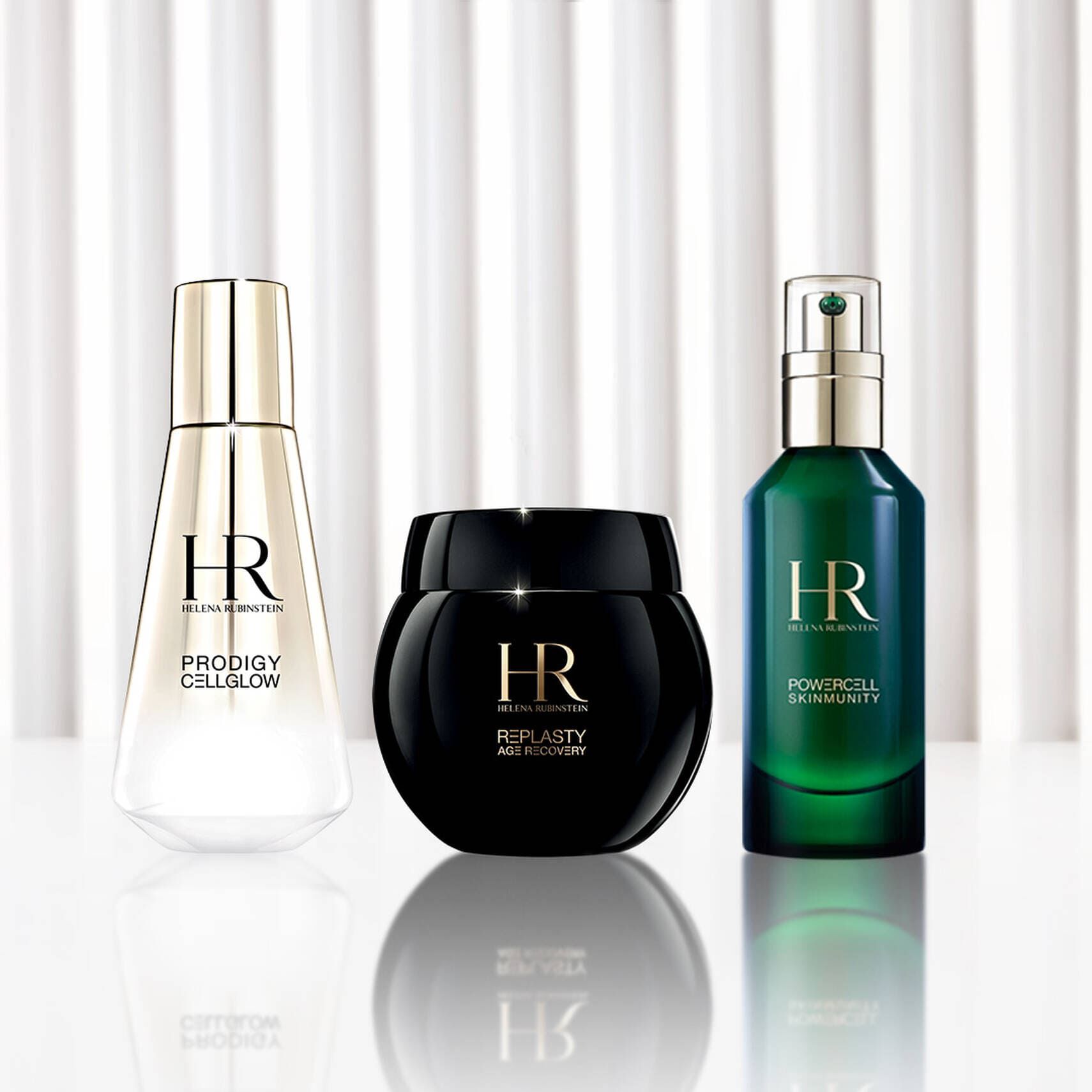 Flaconi di Prodigy Cellglow, crema Re-Plasty Age Recovery e siero Powercell Skinmunity di Helena Rubinstein.